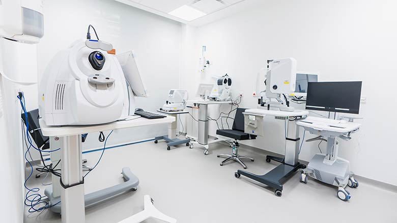 Doctor's office with ophthalmology equipment.