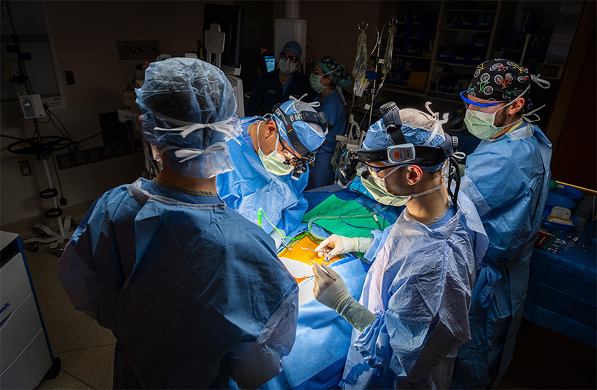 Operation with Dr. Kominsky performing a hypoglossal nerve stimulation with team surrounding patient.